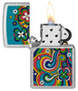 Zippo Flower Power Design Street Chrome Pocklet Pocket with its lid open and lit.