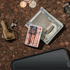 Lifestyle image of Americana Design High Polish Chrome Windproof Lighter in a pocket dump scene.