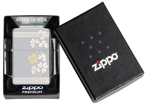 Zippo Laser 360° Clover Design High Polish Chrome Pocket Lighter in its packaging.