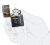 Jack Daniel's® Logo and Bottle Gray Windproof Lighter lit in hand